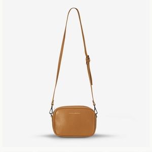 Status anxiety leather crossbody bag